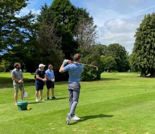 Picture of golfers on the 1st tee at the Ferns Golf Classic  2022