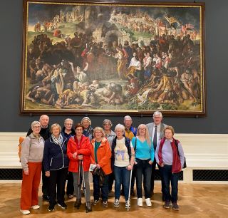 Group of people in front of the painting 'The Marriage of Strongbow & Aoife' in the National Art Gallery, Dublin