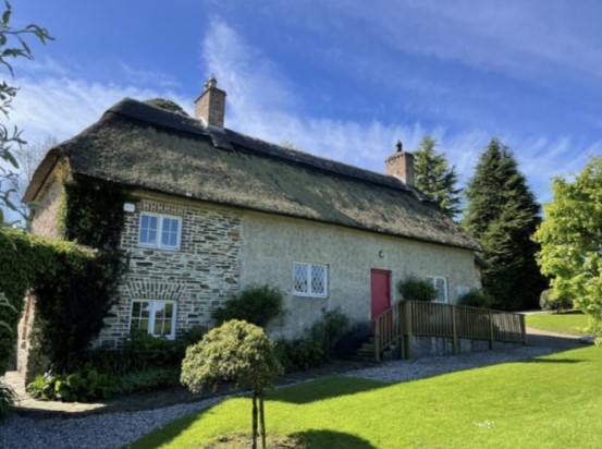 Picture of St Mogue's Cottage, a thatched cottage on the northern approach to Ferns in north Wexford.